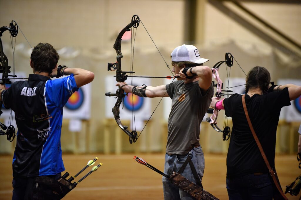 Action shot of archery team members