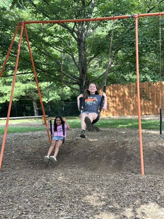 Kids on swings.